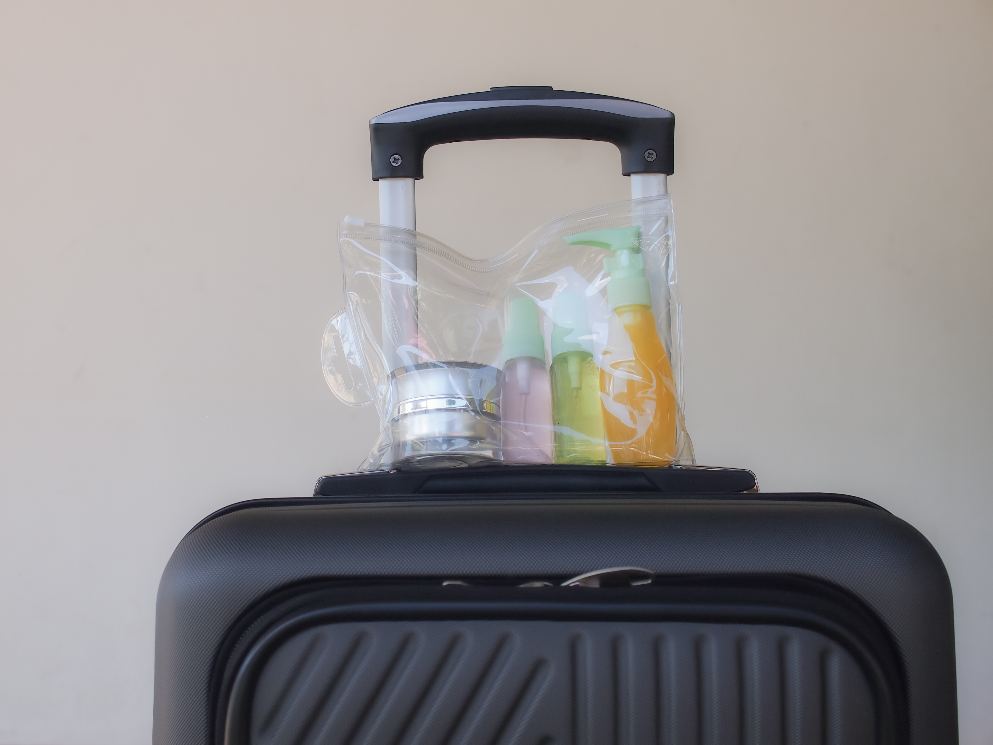 Carry-on liquids in a clear bag following airport security rules